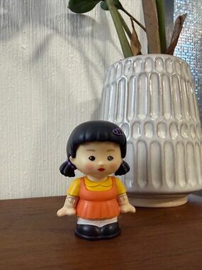 Fisher Price Little People Squid Games Collab doll